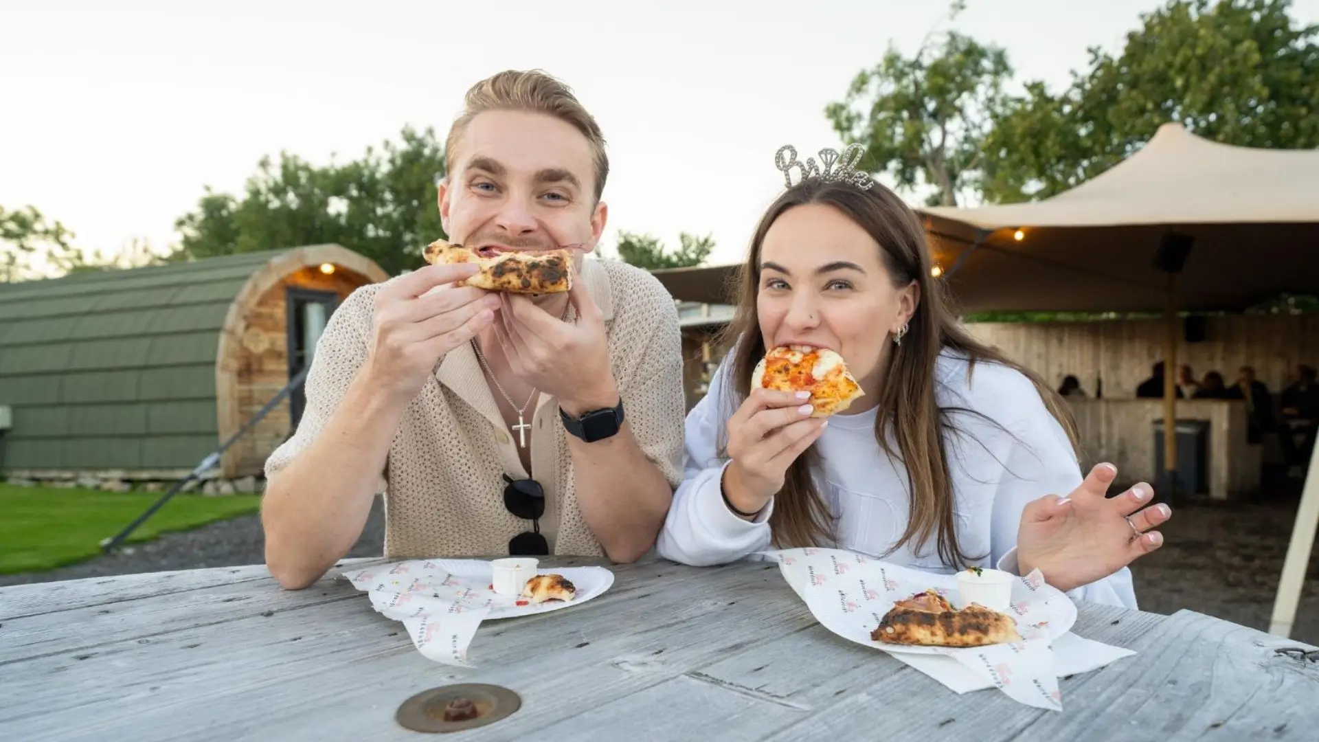 Wedding guests enjoying Weird Dough pizza