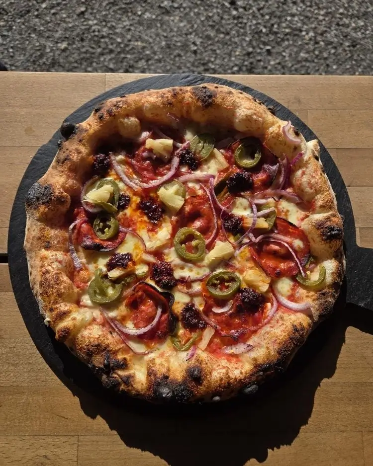 Freshly baked Weird Dough pizza